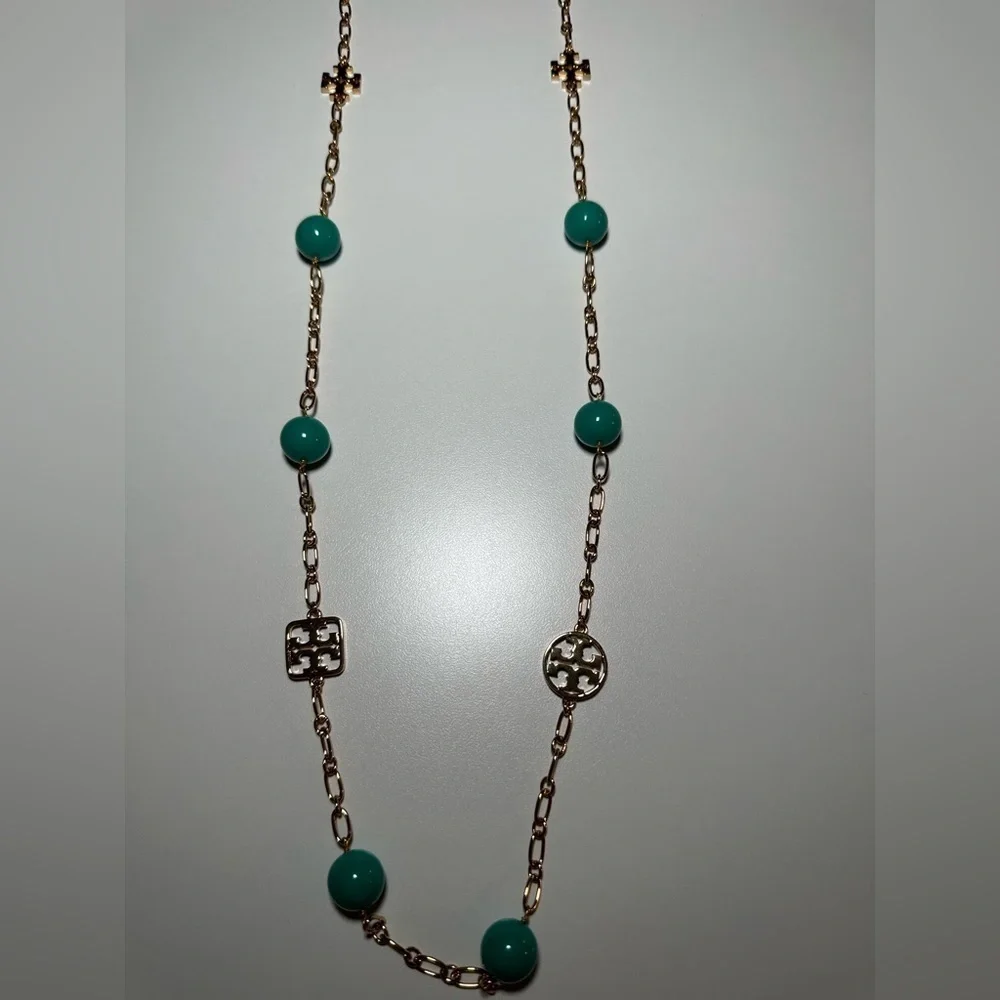 Tory burch gold and turquoise necklace. Brand new with tag and dust bag …